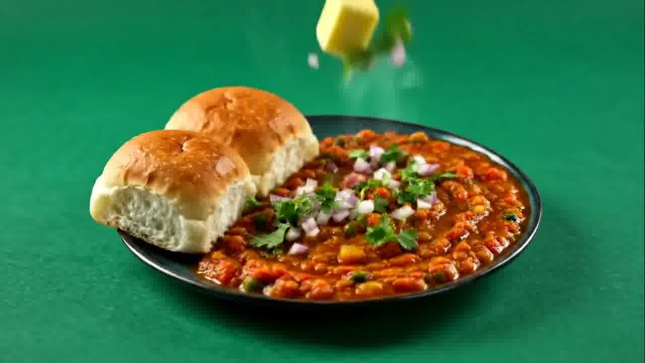 A rich vegetarian plate with fresh garnish